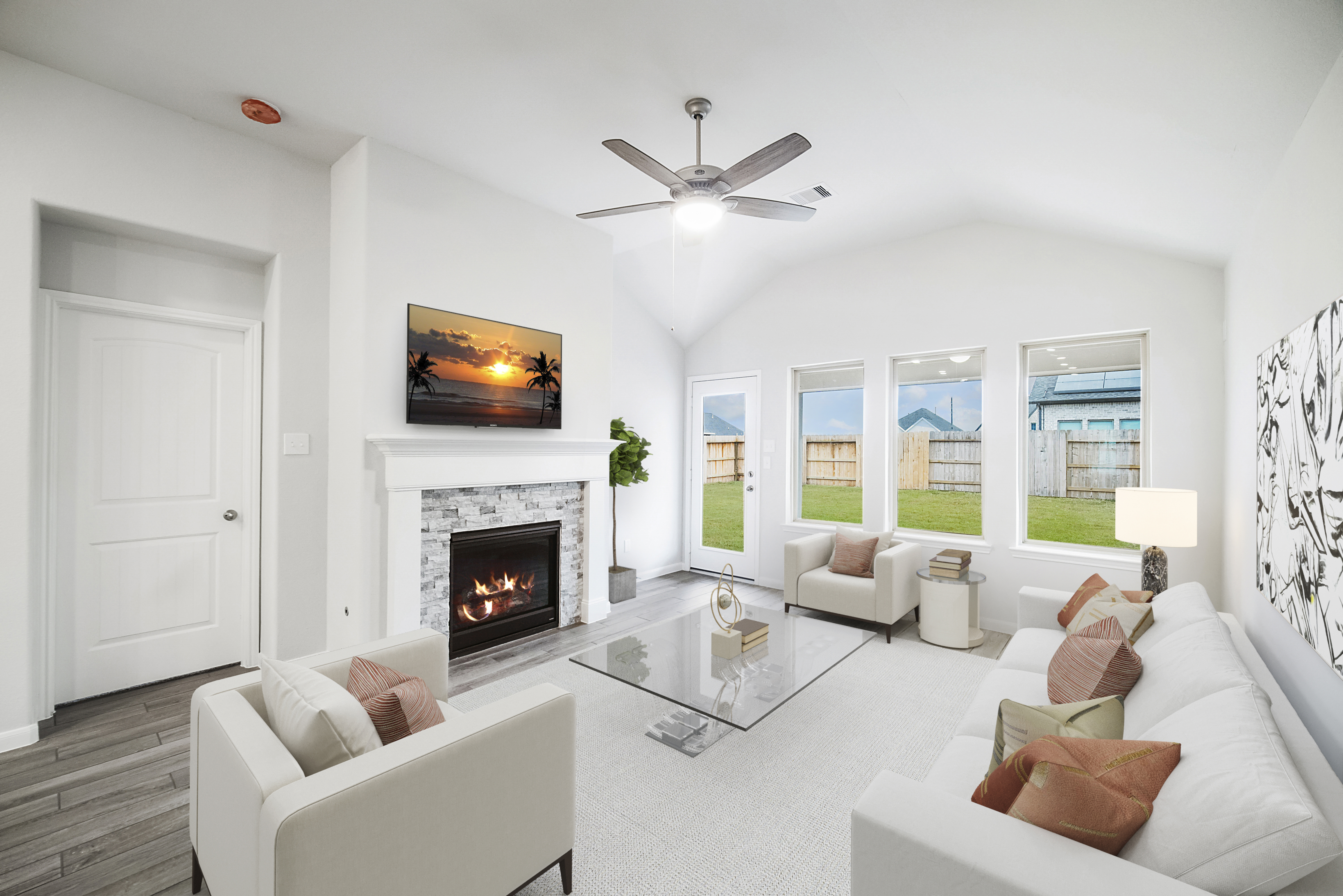 great room with ceiling fan