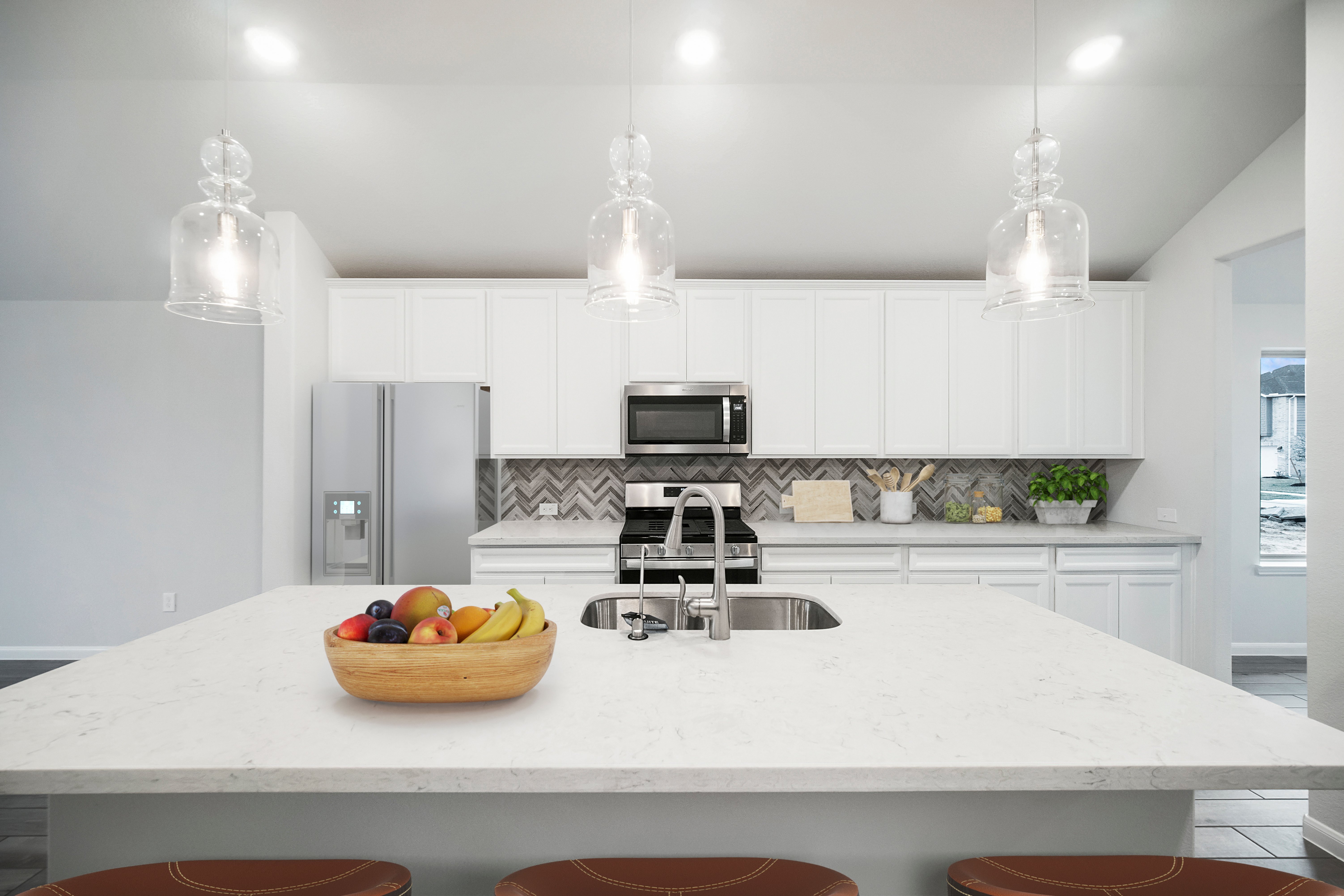 white kitchen with pendant lights