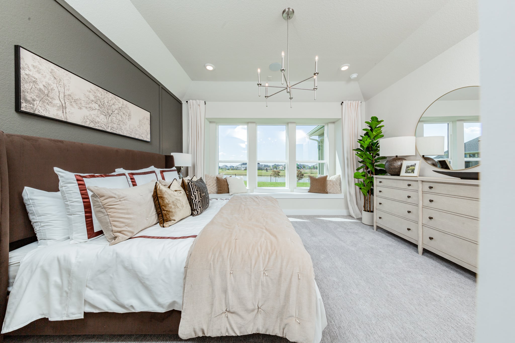 bedroom with art above bed