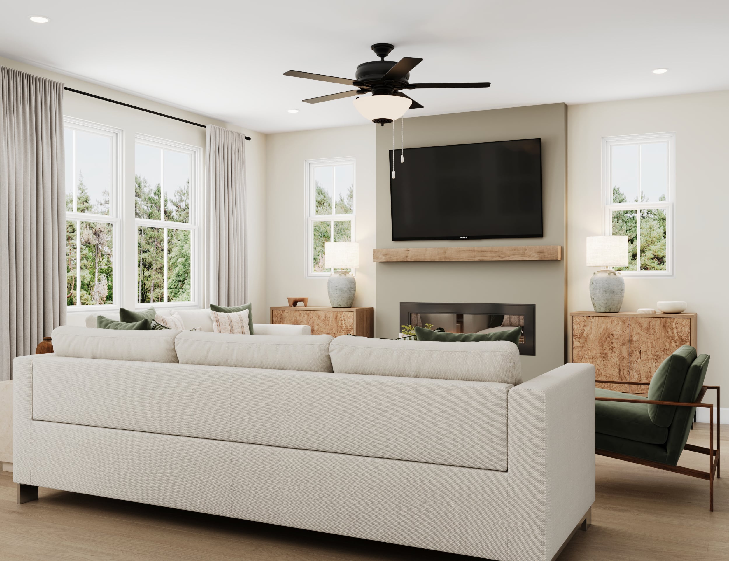 great room with electric fireplace and windows