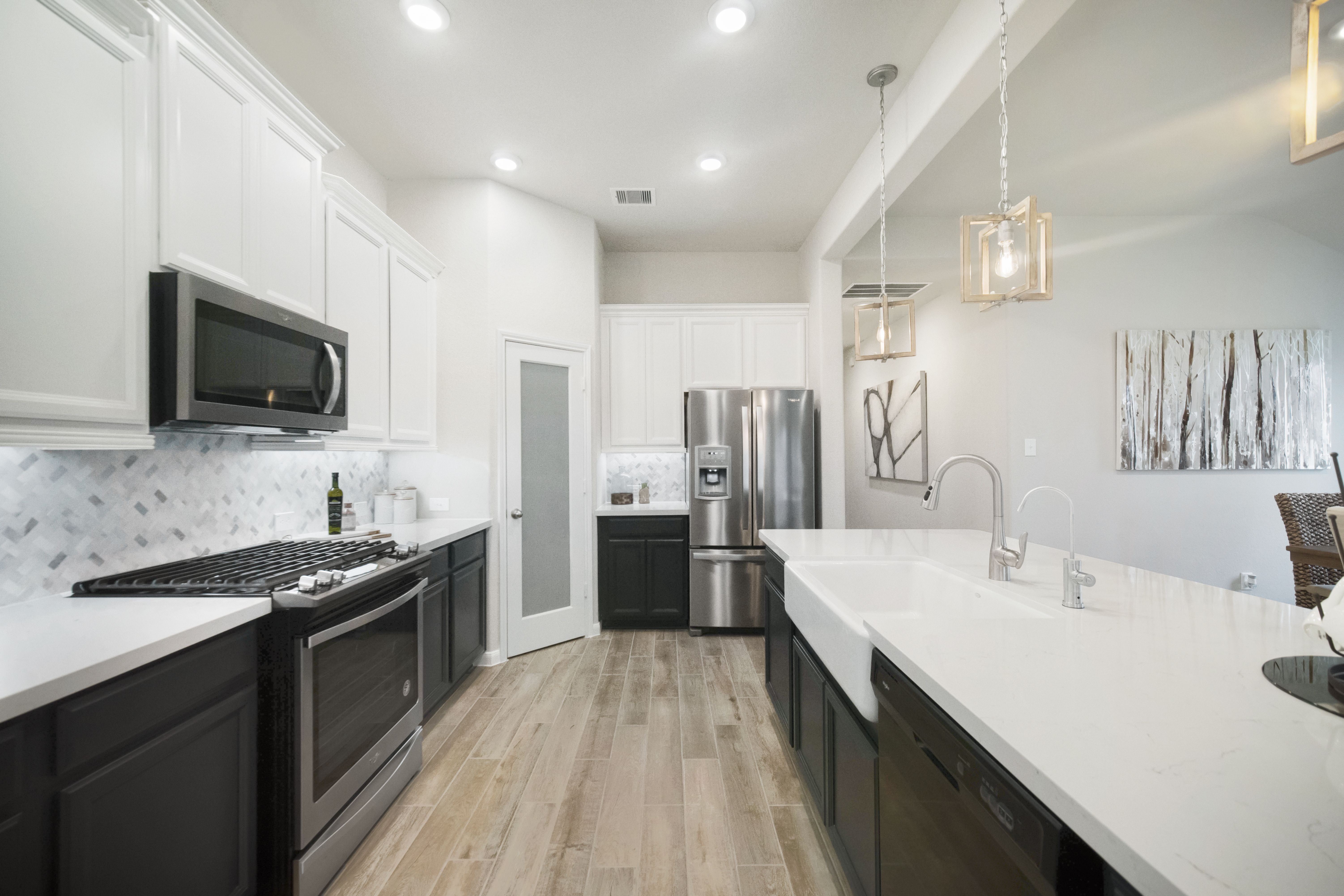 kitchen with two-tone color cabinets