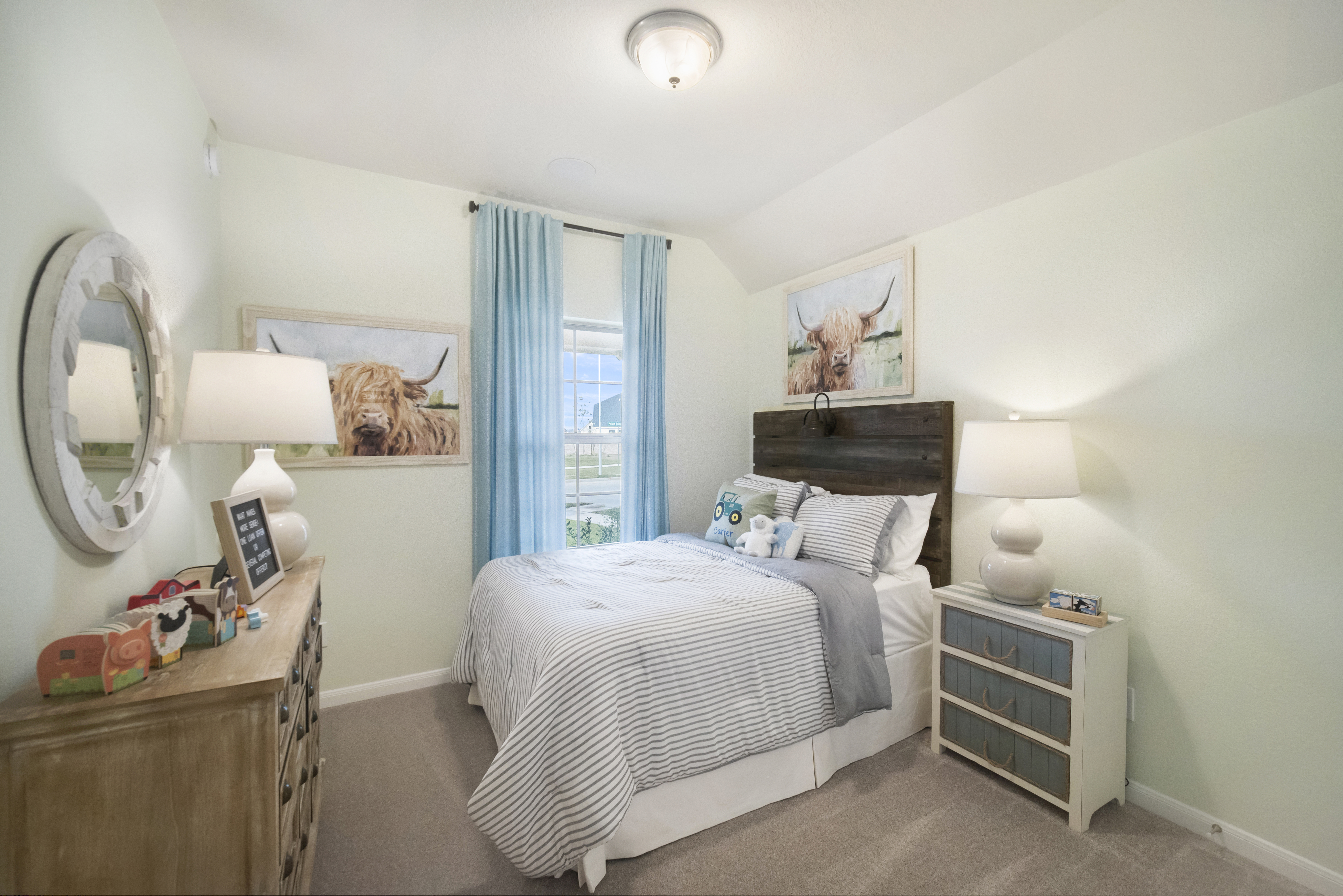 bedroom with one window and art over bed